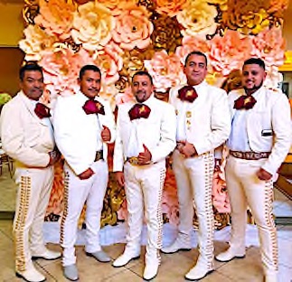 Mariachi band in white charro attire